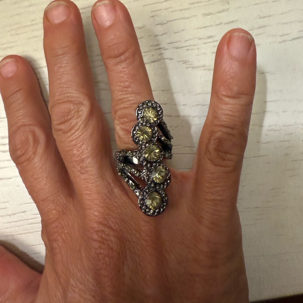Elegant Black and Greenish Ring with stones